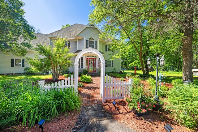 39050 Twin Lakes Rd, Menahga, MN 56464 - traditional-style home with french doors, roof with shingles, and fence