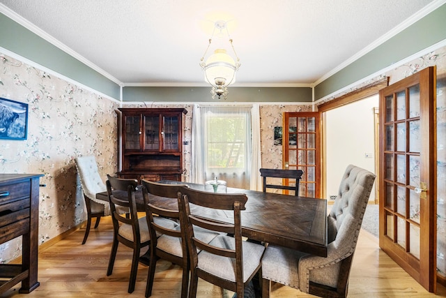 39050 Twin Lakes Rd, Menahga, MN 56464 - dining room with baseboards, ornamental molding, and wood finished floors