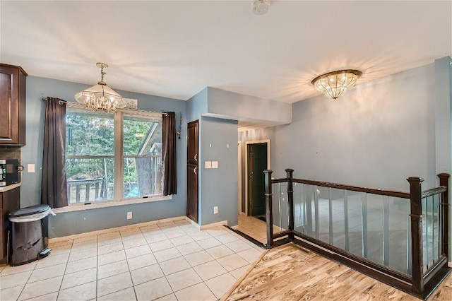 interior space featuring a notable chandelier