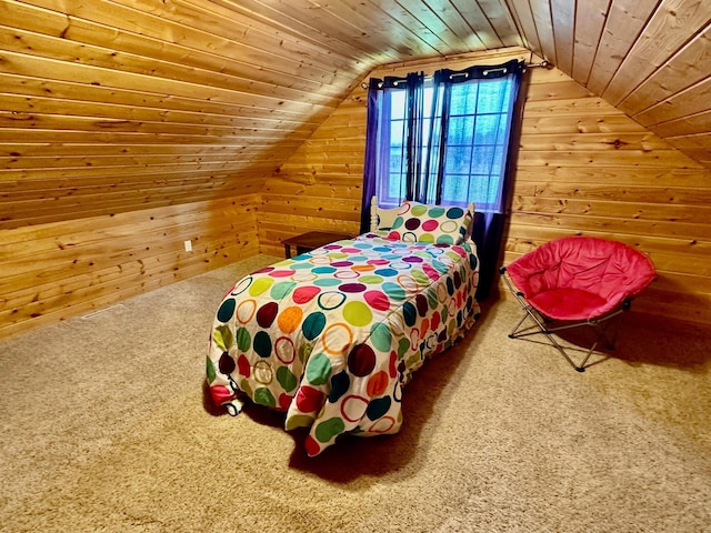 carpeted bedroom featuring wooden walls, vaulted ceiling, and wooden ceiling