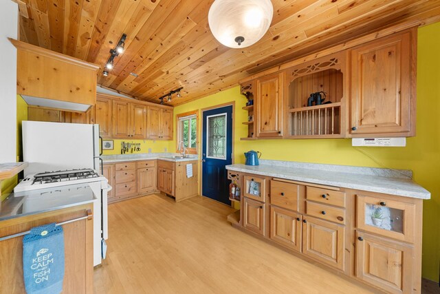 1738 White Ash Dr Unit A, Balsam Lake, WI 54810 - kitchen with white appliances, open shelves, vaulted ceiling, wooden ceiling, and a sink