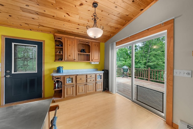 1738 White Ash Dr Unit A, Balsam Lake, WI 54810 - kitchen featuring baseboard heating, vaulted ceiling, light wood-style flooring, open shelves, and wooden ceiling