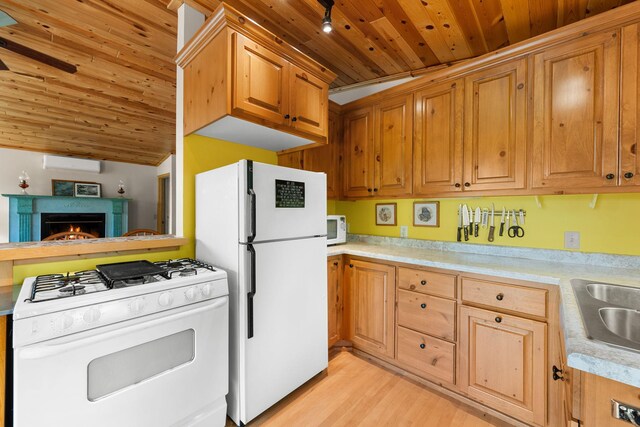 1738 White Ash Dr Unit A, Balsam Lake, WI 54810 - kitchen with wooden ceiling, light countertops, light wood-type flooring, white appliances, and a wall mounted AC