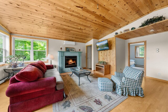 1738 White Ash Dr Unit A, Balsam Lake, WI 54810 - living area featuring a fireplace, vaulted ceiling, wood ceiling, a wall mounted AC, and wood finished floors