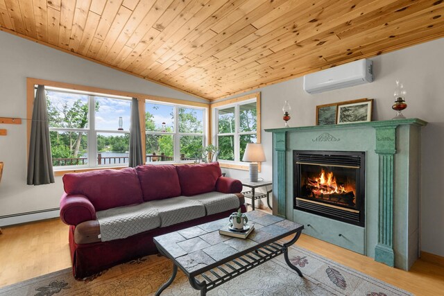 1738 White Ash Dr Unit A, Balsam Lake, WI 54810 - living room with a healthy amount of sunlight, a wall mounted air conditioner, a glass covered fireplace, and vaulted ceiling