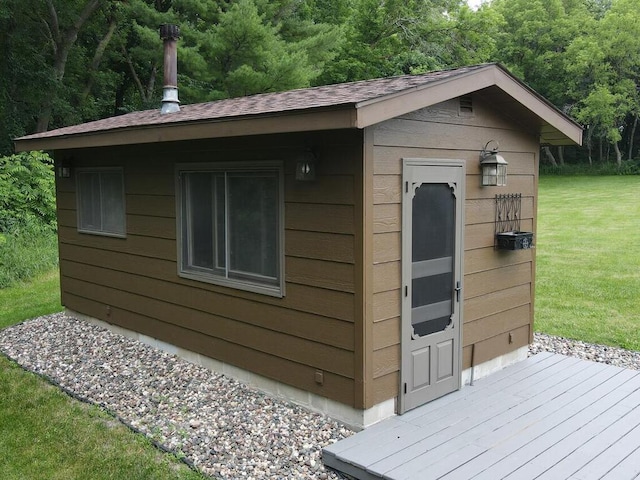 view of outdoor structure with a yard