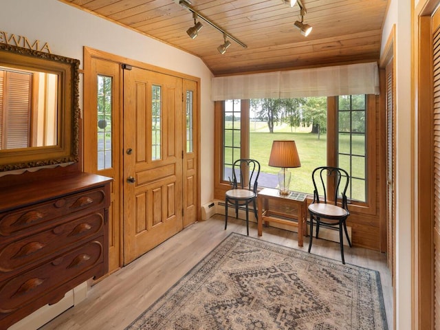 sitting room with rail lighting, vaulted ceiling, wood ceiling, and light hardwood / wood-style floors