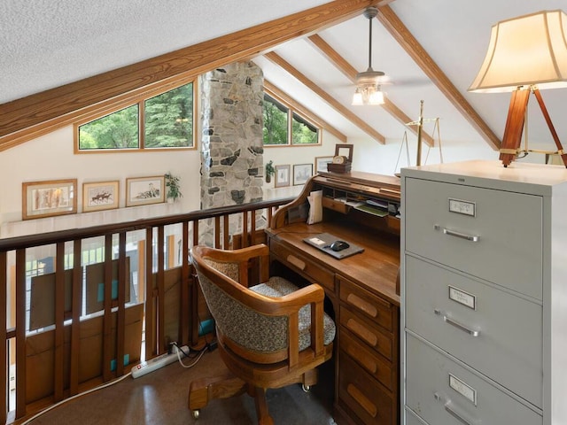 home office with vaulted ceiling with beams, a textured ceiling, and ceiling fan