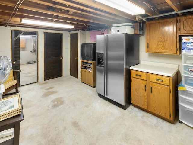 kitchen with stainless steel fridge with ice dispenser