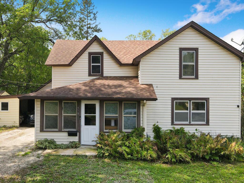 518 2nd St S, Waterville, MN 56096 - traditional home with roof with shingles
