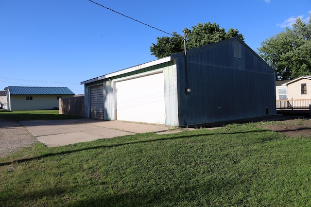 garage with a lawn