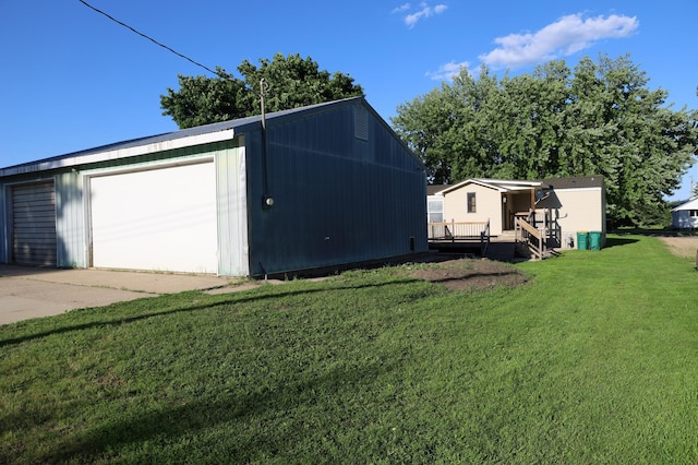 garage with a yard