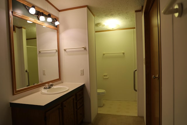 bathroom featuring a shower, crown molding, a textured ceiling, toilet, and vanity