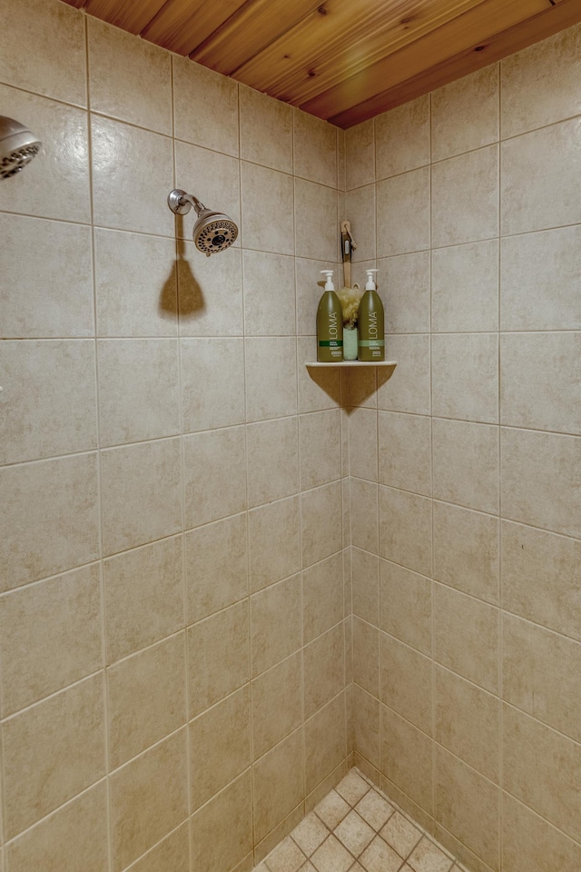 bathroom with tiled shower