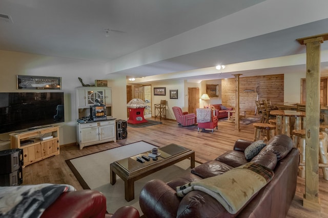 living room with light hardwood / wood-style floors