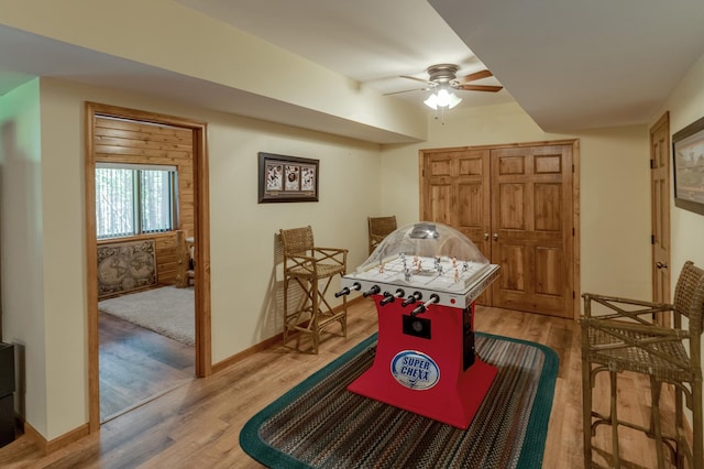 game room featuring ceiling fan and light hardwood / wood-style floors