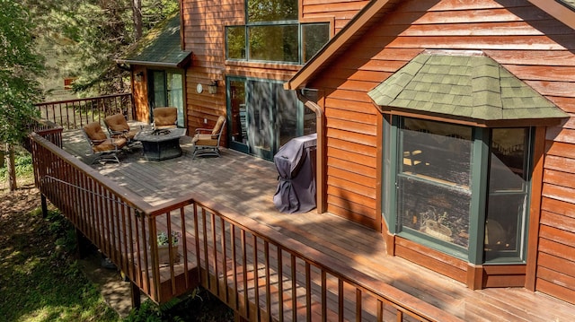 deck featuring outdoor lounge area