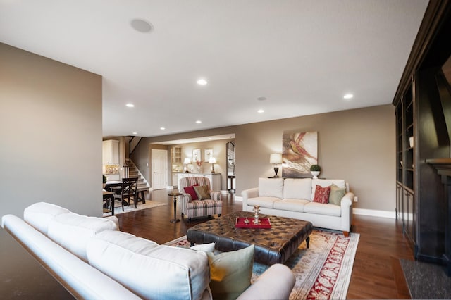 living room with dark wood-type flooring