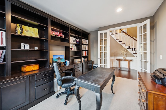 office space with wood-type flooring and french doors