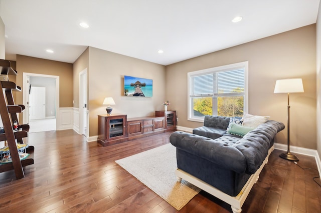 living room featuring dark hardwood / wood-style flooring