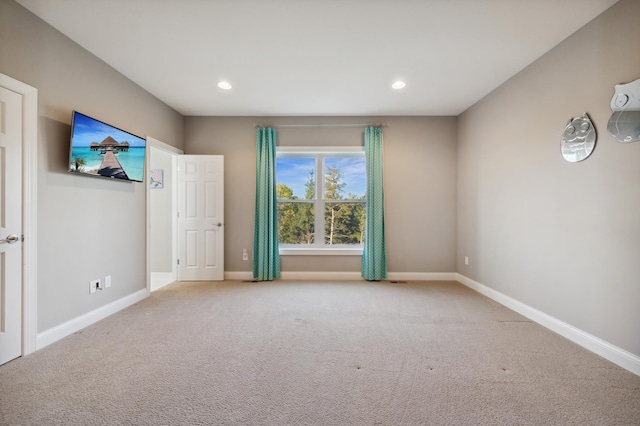 view of carpeted spare room