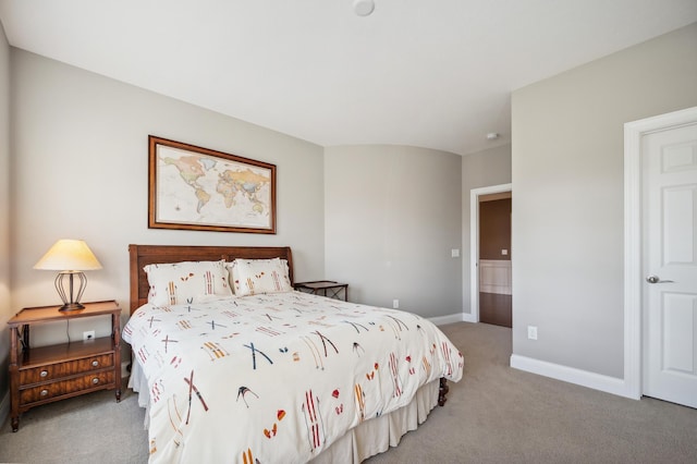 bedroom featuring light colored carpet