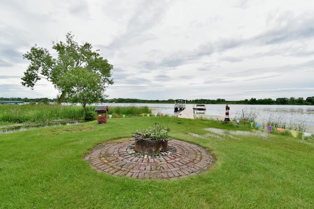 46350 Cambridge Dr, Stanchfield, MN 55080 - view of green lawn featuring a water view