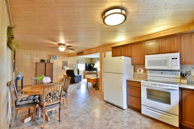 46350 Cambridge Dr, Stanchfield, MN 55080 - kitchen with white appliances, brown cabinetry, decorative backsplash, ceiling fan, and wooden ceiling