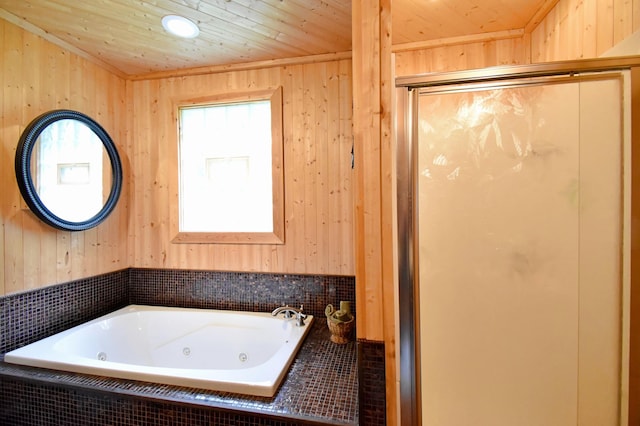 46350 Cambridge Dr, Stanchfield, MN 55080 - bathroom featuring a whirlpool tub, a stall shower, wood walls, and wooden ceiling