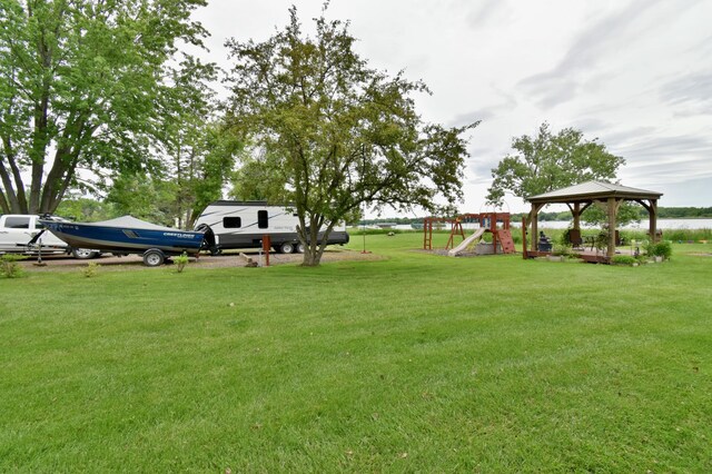 46350 Cambridge Dr, Stanchfield, MN 55080 - view of green lawn with a gazebo