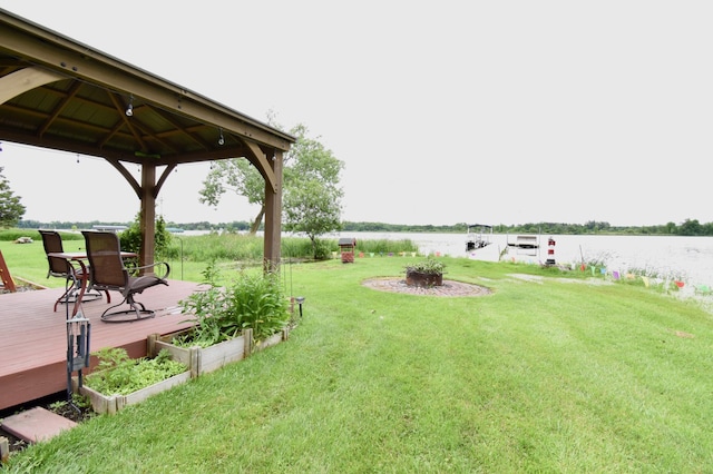 46350 Cambridge Dr, Stanchfield, MN 55080 - view of grassy yard featuring a gazebo and a deck with water view