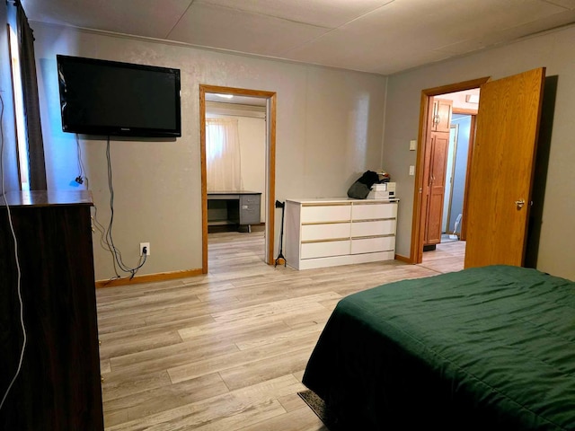 bedroom featuring light wood-type flooring