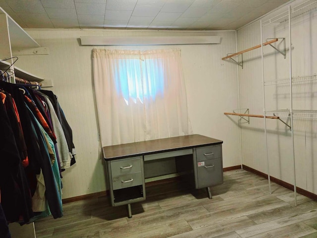 spacious closet featuring hardwood / wood-style floors