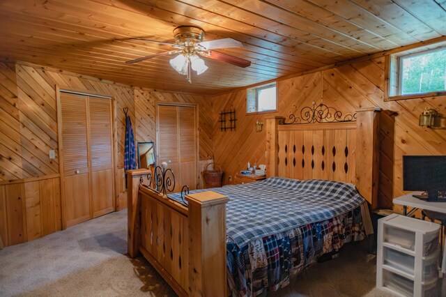 bedroom featuring multiple windows, ceiling fan, and wooden ceiling