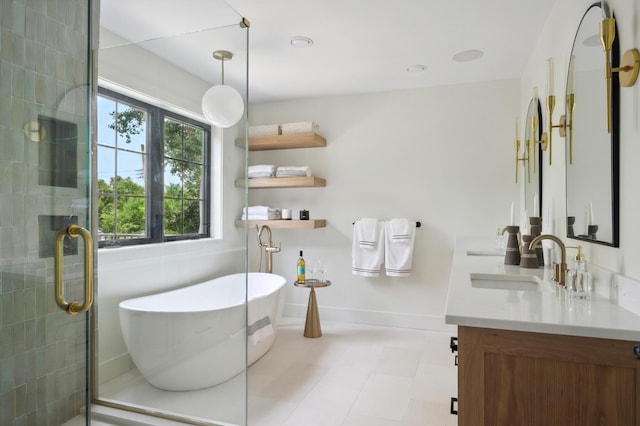 bathroom featuring tile patterned floors, vanity, and shower with separate bathtub