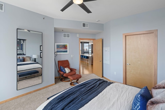 1240 2nd St Unit 1201, Minneapolis, MN 55415 - carpeted bedroom with baseboards and a ceiling fan