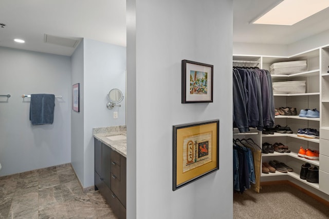 1240 2nd St Unit 1201, Minneapolis, MN 55415 - full bath with vanity and a walk in closet