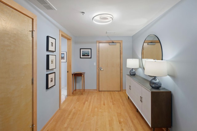 1240 2nd St Unit 1201, Minneapolis, MN 55415 - corridor featuring light wood-style floors and baseboards