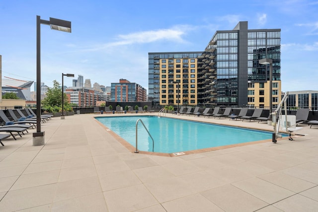 1240 2nd St Unit 1201, Minneapolis, MN 55415 - community pool featuring a city view and a patio