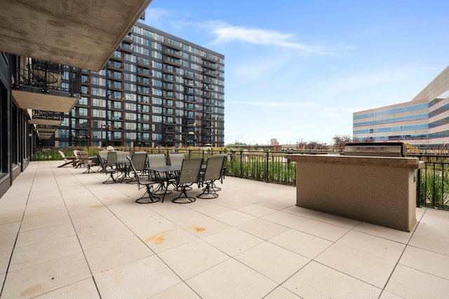 1240 2nd St Unit 1201, Minneapolis, MN 55415 - view of patio featuring outdoor dining space