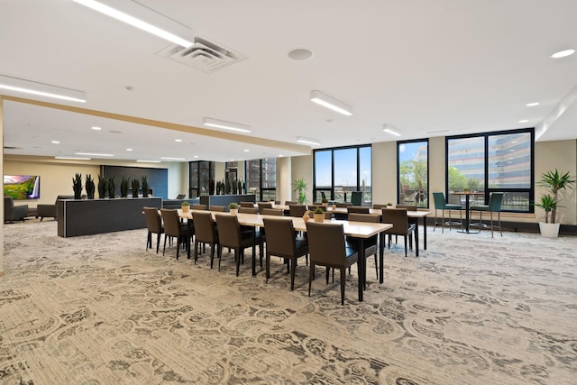 1240 2nd St Unit 1201, Minneapolis, MN 55415 - carpeted dining area with floor to ceiling windows and recessed lighting