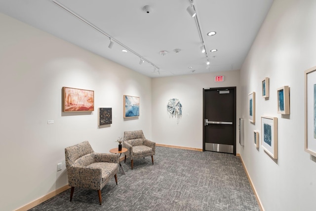1240 2nd St Unit 1201, Minneapolis, MN 55415 - living area featuring rail lighting and carpet floors