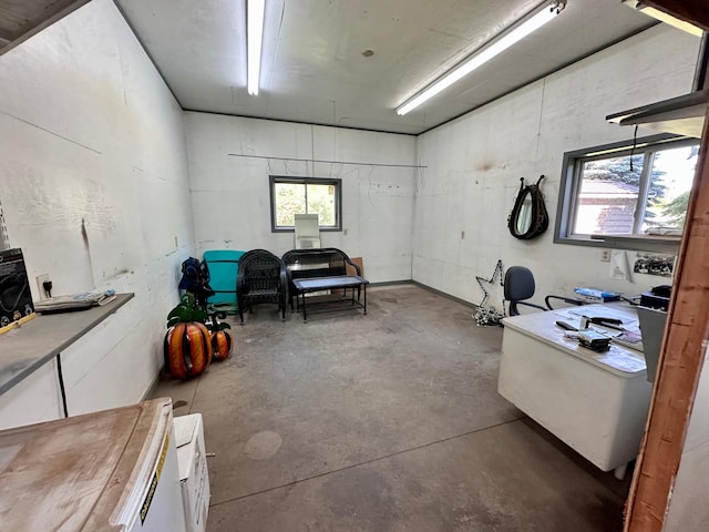 miscellaneous room with concrete floors and plenty of natural light