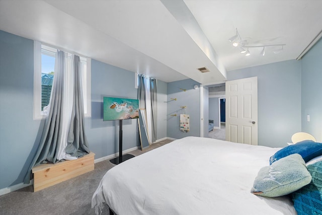 bedroom featuring ceiling fan and carpet flooring