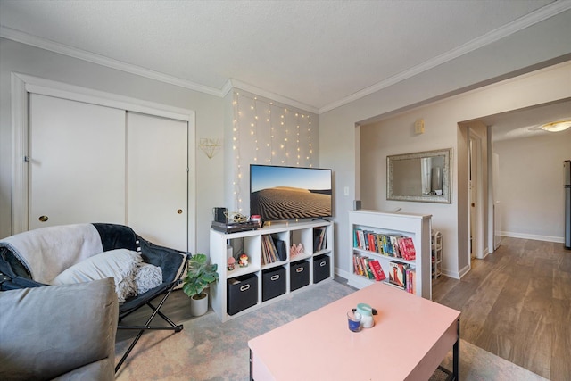 living room featuring crown molding and wood-type flooring