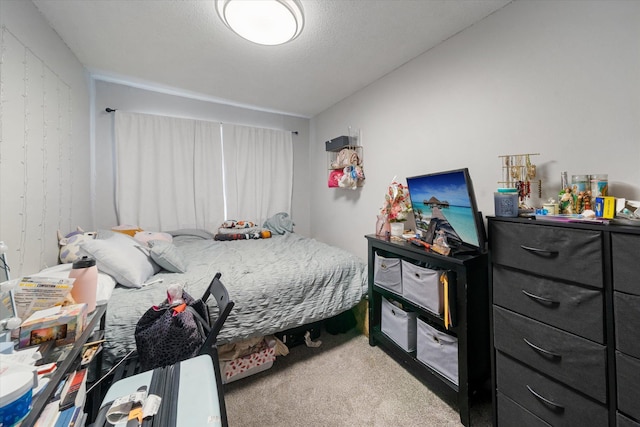 bedroom featuring carpet flooring