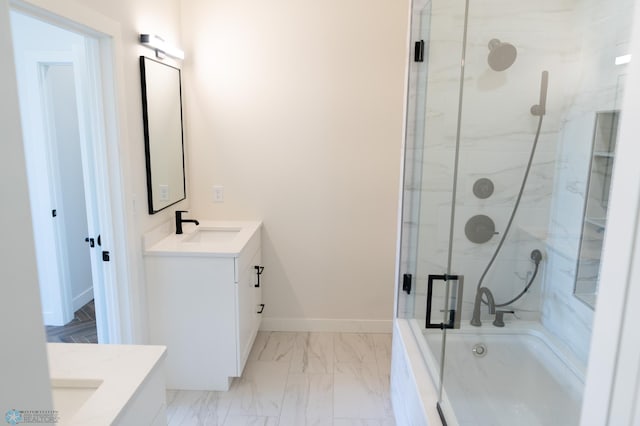 bathroom featuring vanity and independent shower and bath