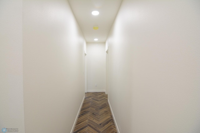 hall featuring parquet floors