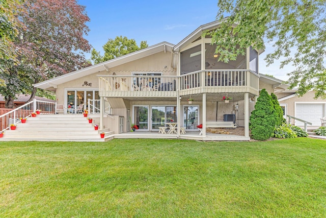 750 Carla Ln, Little Canada, MN 55109 - back of house with a deck, stairway, and a lawn