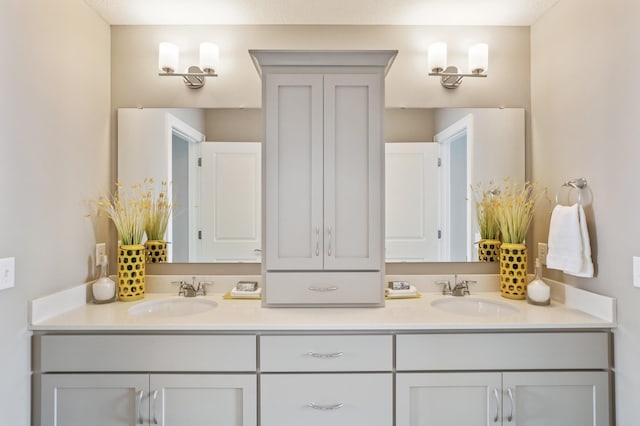 bathroom with dual vanity